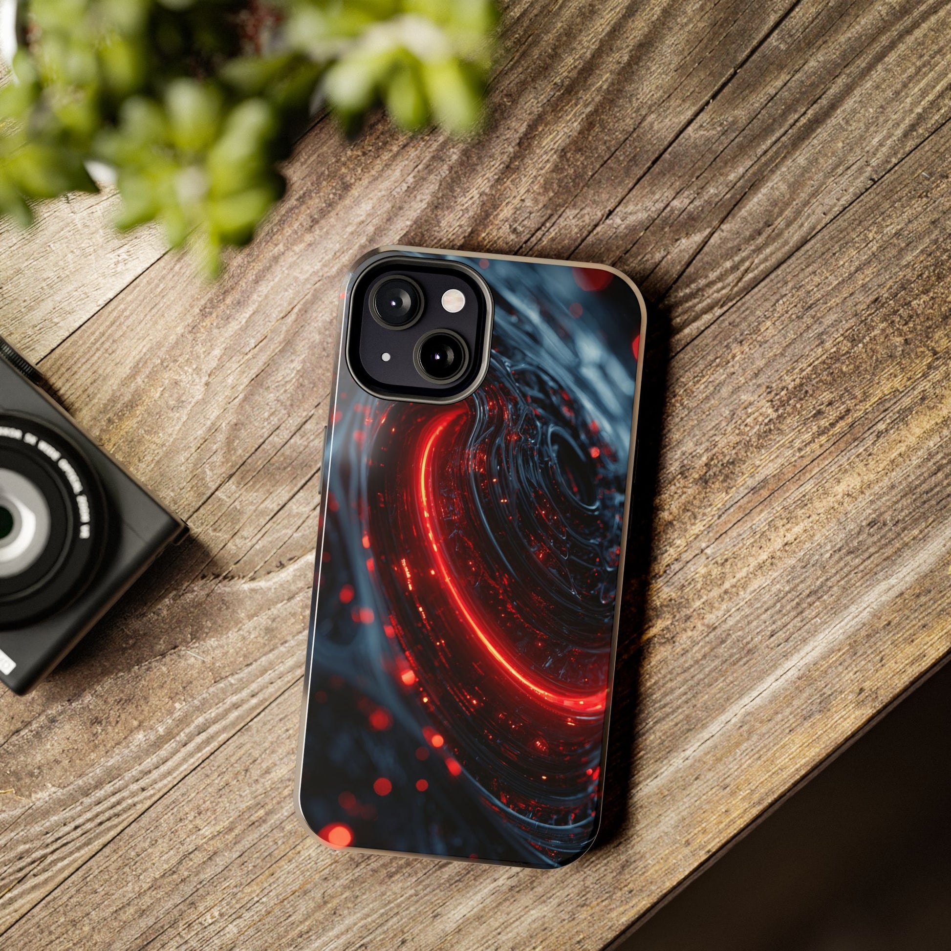 Artistic phone case with bold red cosmic vortex pattern