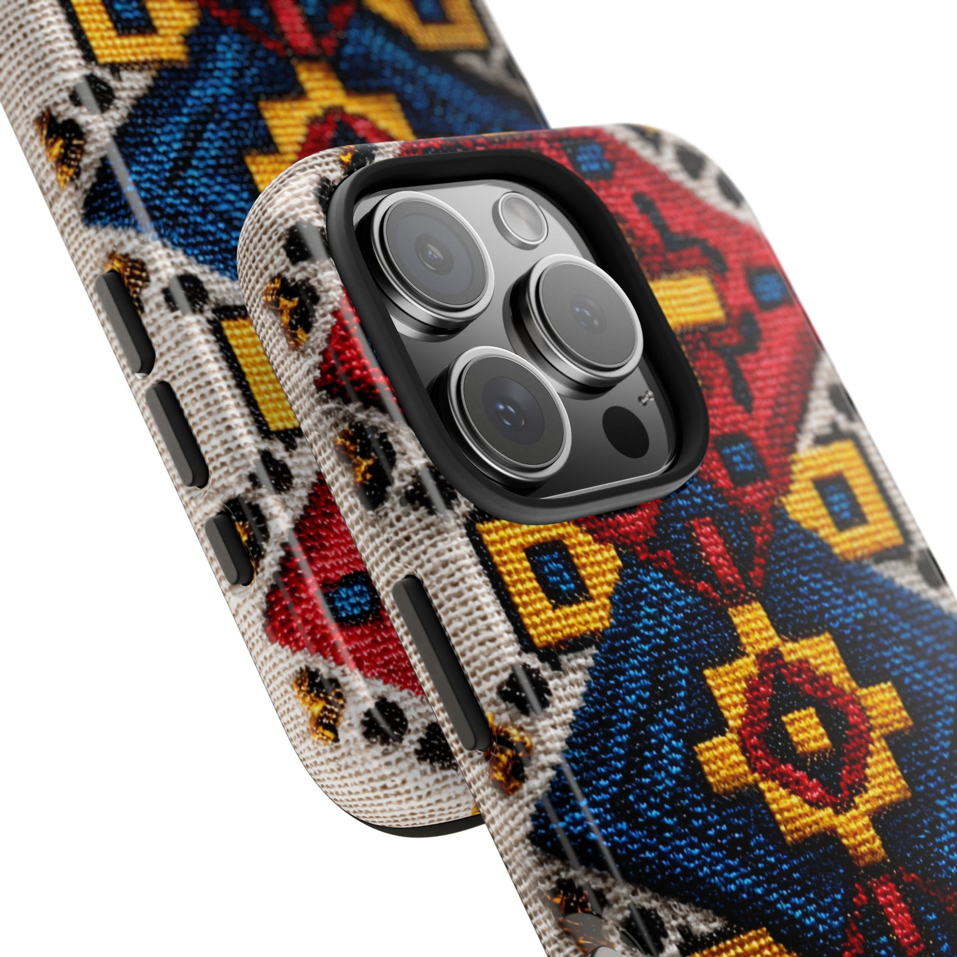 Close-up of traditional embroidery motifs on phone cover